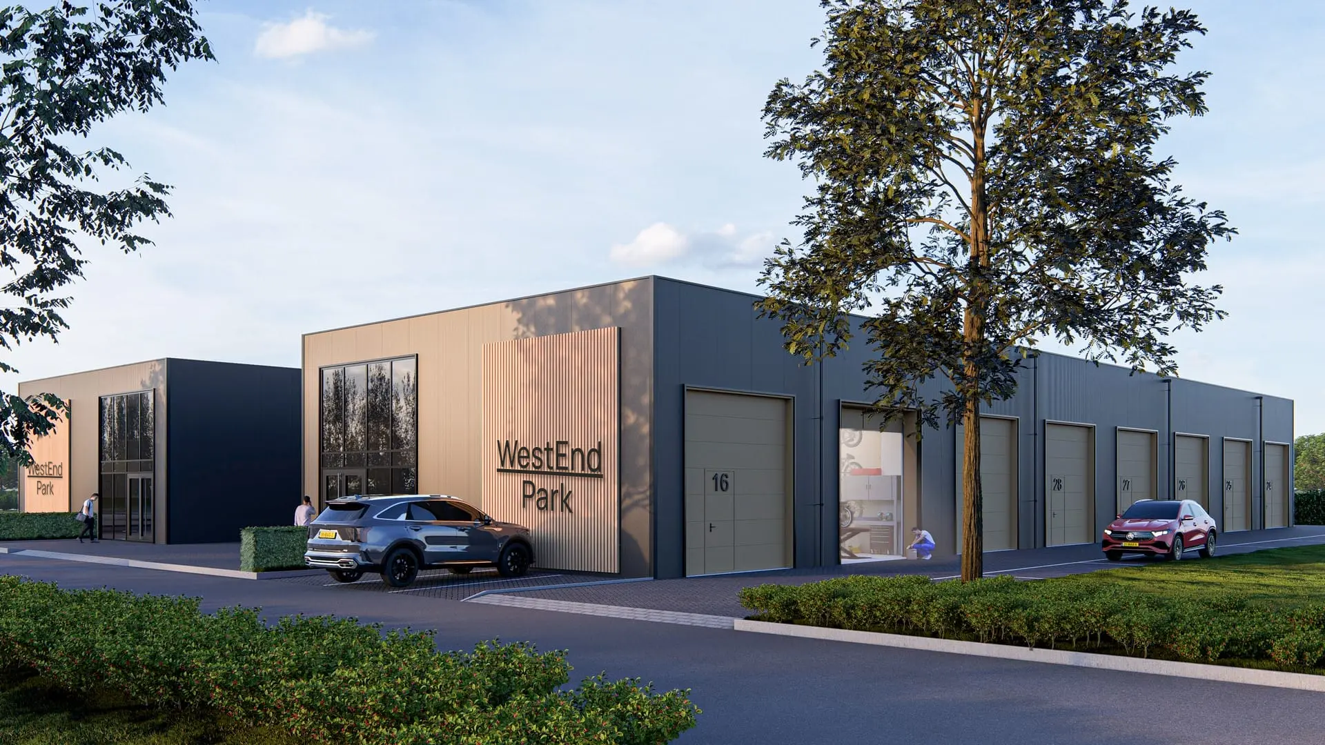 Modern WestEnd Park light-industrial units with timber and charcoal cladding, large signage, overhead doors and landscaped frontage